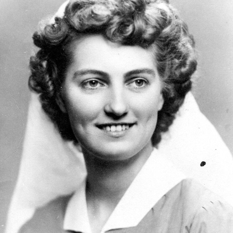 Black and white photo of a woman with curly hair